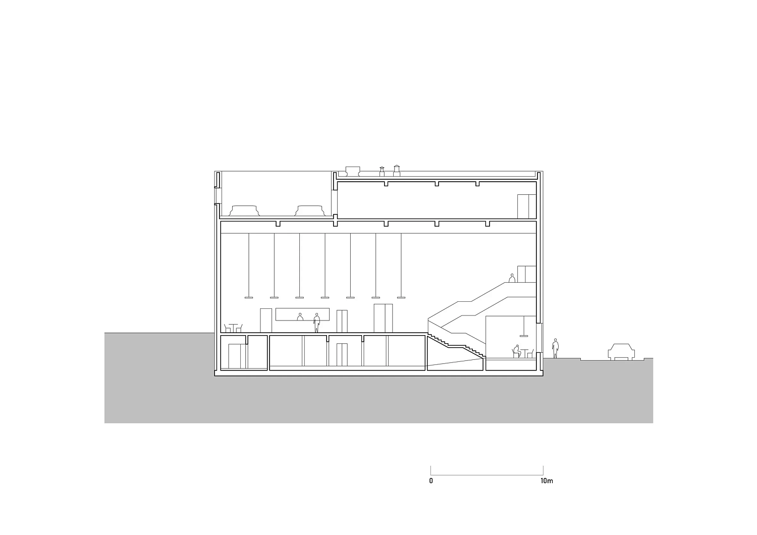 SLAS Architekci окутывает польский концертный зал зеркальным стальным фасадом